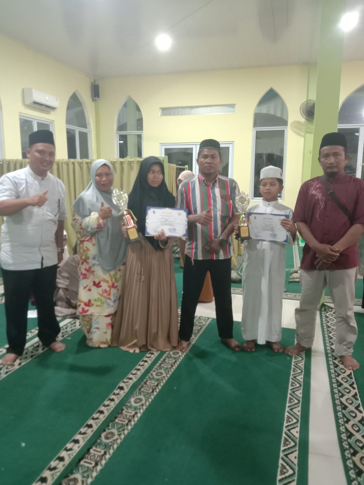 Kafilah RW 14 Juara I Kategori Tahfizh Anak-anak Putri Pada MTQ ke X Kelurahan Pebatuan