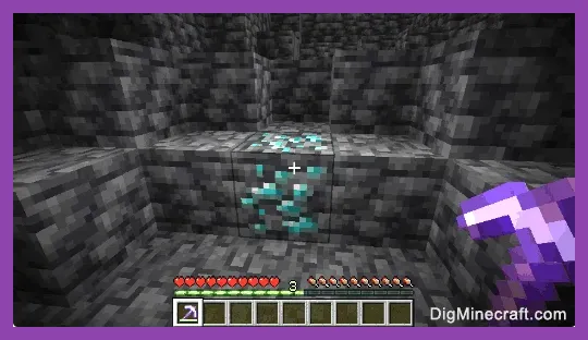 Player mining diamonds deep underground in Minecraft PE