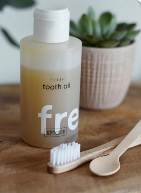 FRESH tooth oil bottle in serene morning light