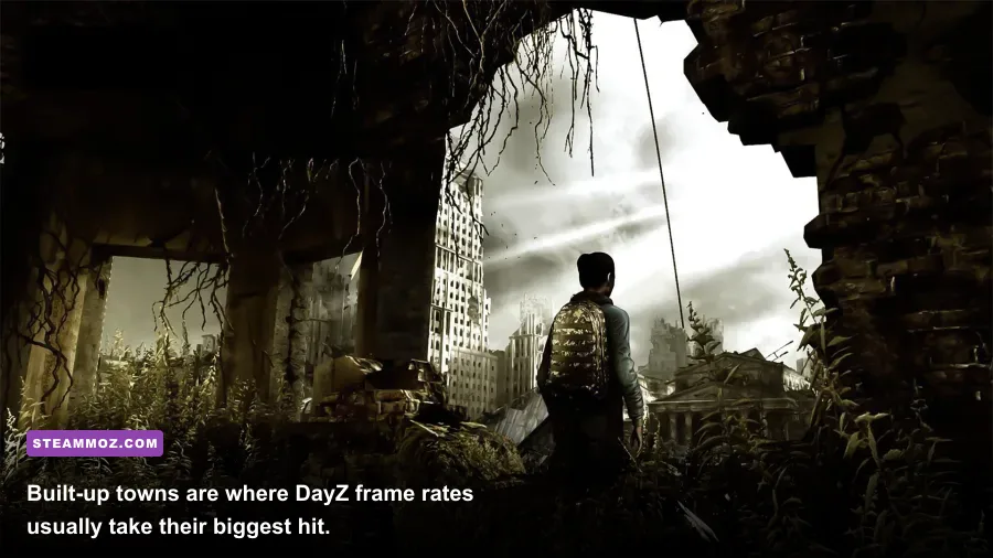 DayZ Chernarus town gameplay showing buildings and dense scenery during a PC benchmark