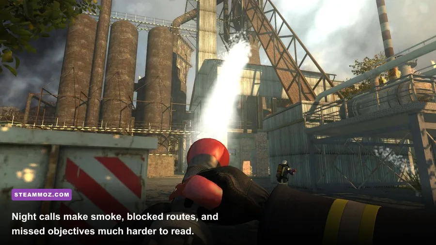 Firefighters 2014 night mission with emergency vehicles and burning building