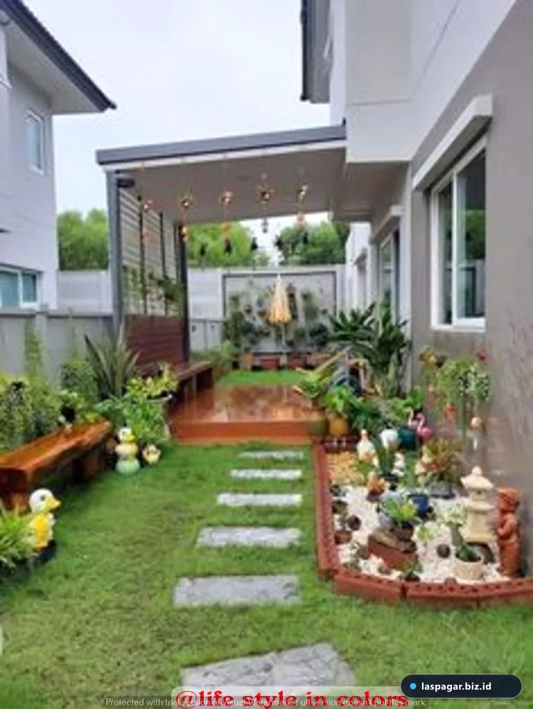 Taman depan rumah subsidi type 36 yang rapi dan asri