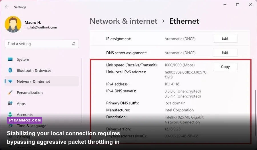 Windows network adapter properties dialog with QoS Packet Scheduler configuration