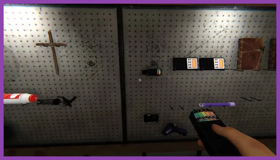 Player holding EMF reader in a dark Phasmophobia map room